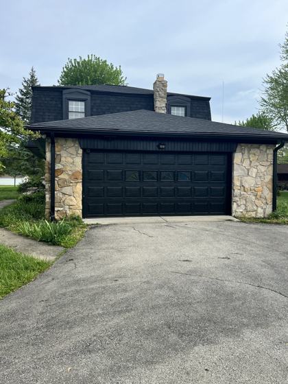 Exterior Repaint of a Stone and Shingle Home